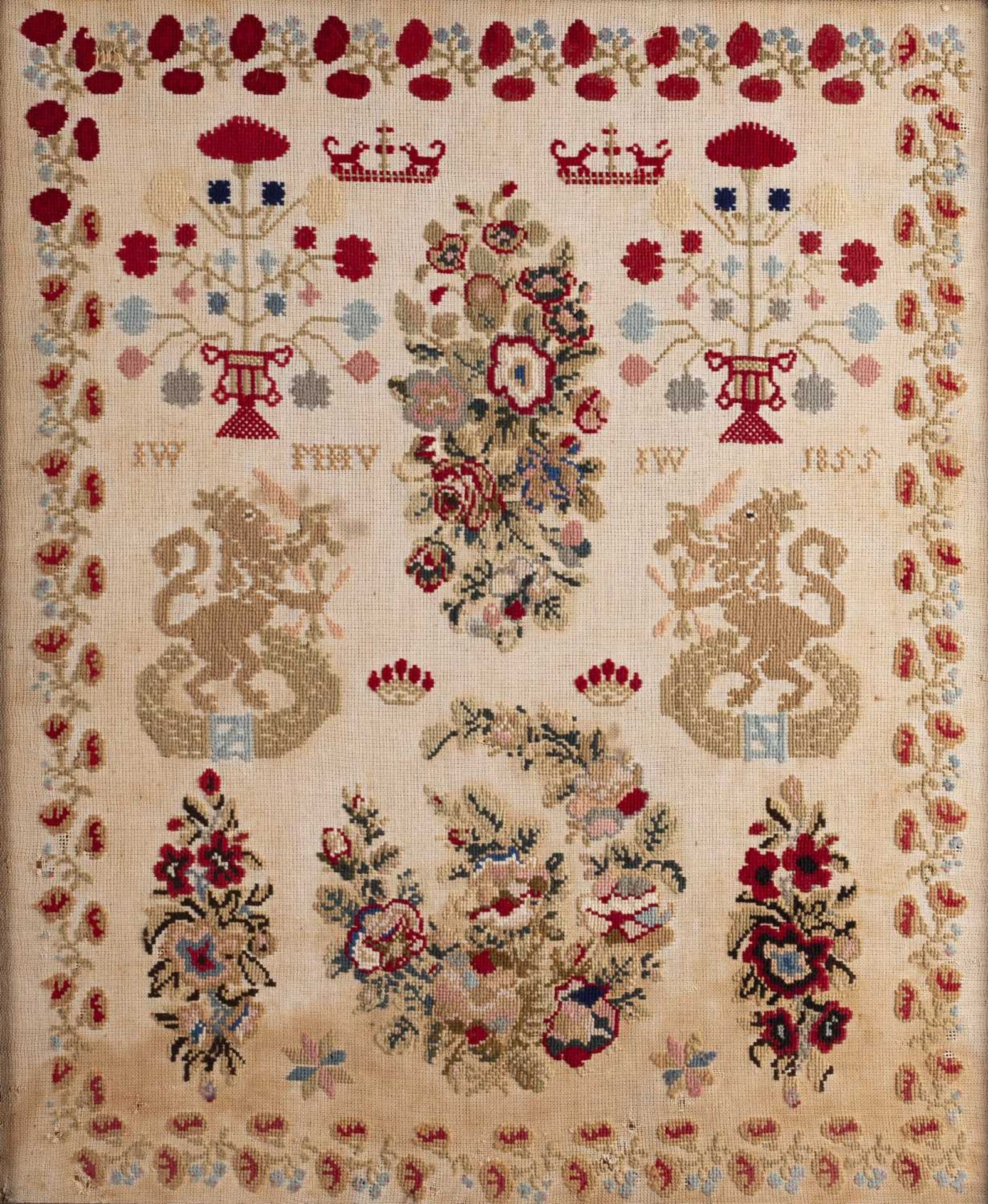 19th Century Dutch needlework sampler decorated with flowers, dogs and lions, dated 1855, with