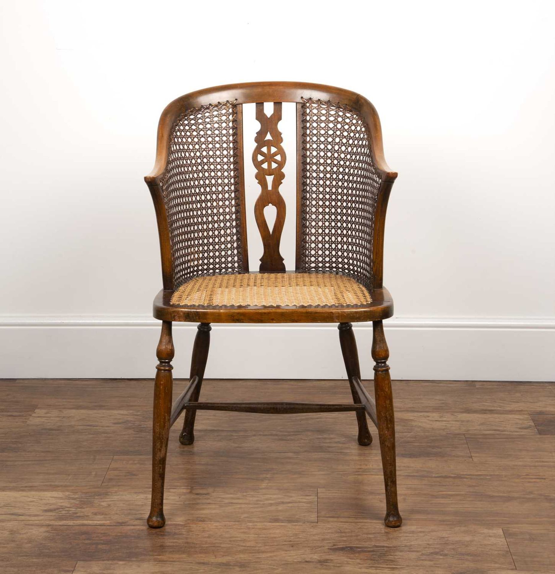 Edwardian bergere caned chair by Arthur Newbery Ltd, beech frame, with pierced wheel splat to the - Bild 2 aus 3