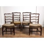 Set of four Chippendale style ladderback dining chairs 18th/19th Century, each with carved