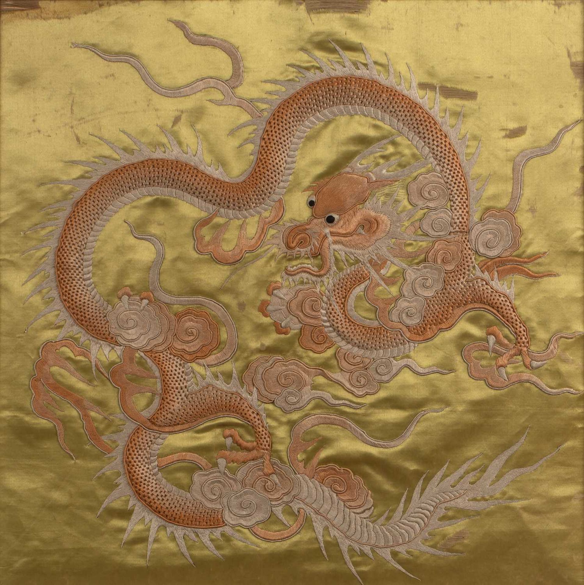 Silk and embroidered study of a dragon and flaming pearls Chinese, on a yellow ground, 40cm