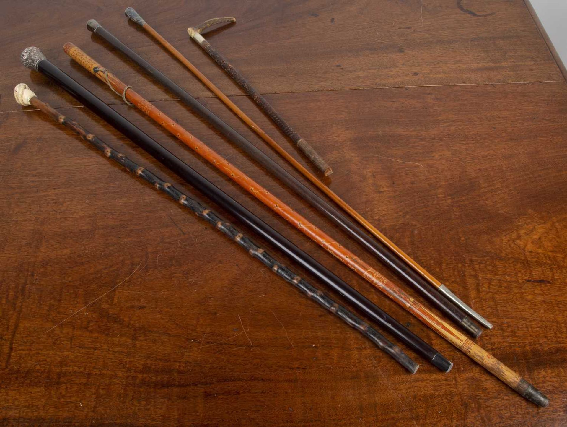 Collection of Victorian and later walking canes and riding crops, comprising of: a Sinhalese - Image 2 of 4