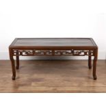 Chinese Hardwood low table 19th Century, with scroll frieze and shaped supports, 127cm long, 56cm