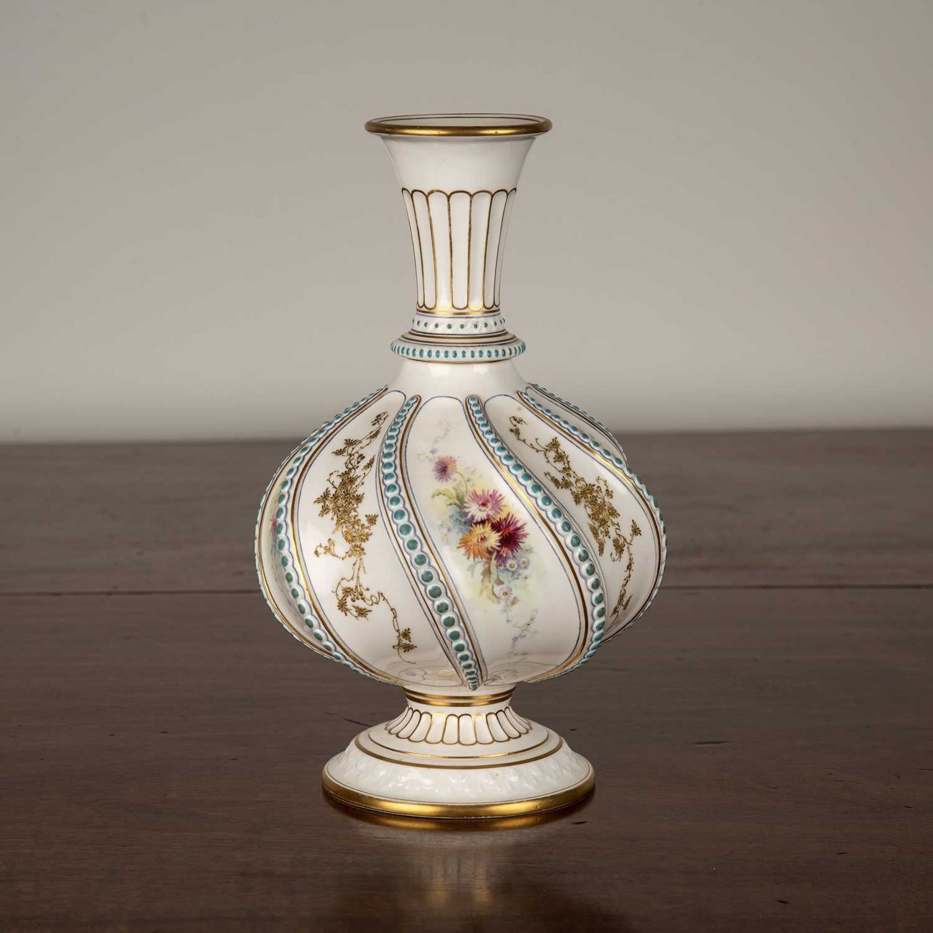 Royal Worcester porcelain vase the body of wrythen form decorated with handpainted flowers and