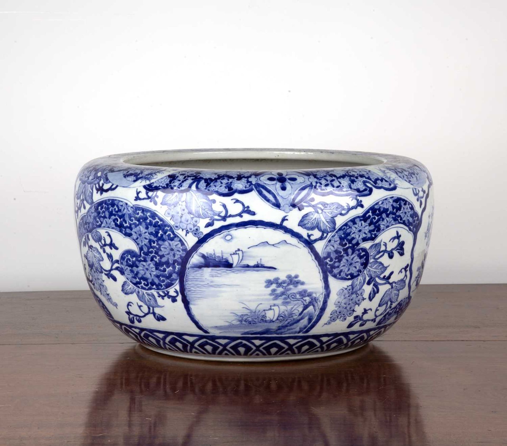 Japanese fish bowl or footbath Late 19th/early 20th Century, ceramic, with blue and white floral