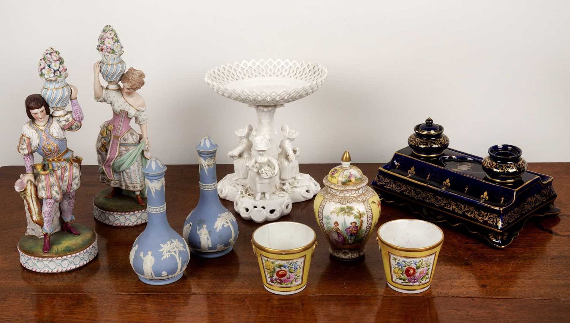 Group of porcelain mostly 19th Century, to include a Dresden figural tazza, a blue ground glass