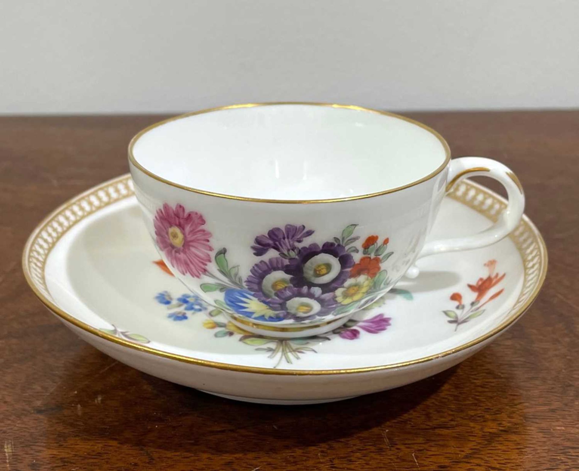 Meissen cabinet cup and saucer porcelain, painted with flowers and gilt decoration, underglaze