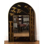 Black ground arched mirror 20th Century, in the Chinese manner, decorated with bamboos and birds,