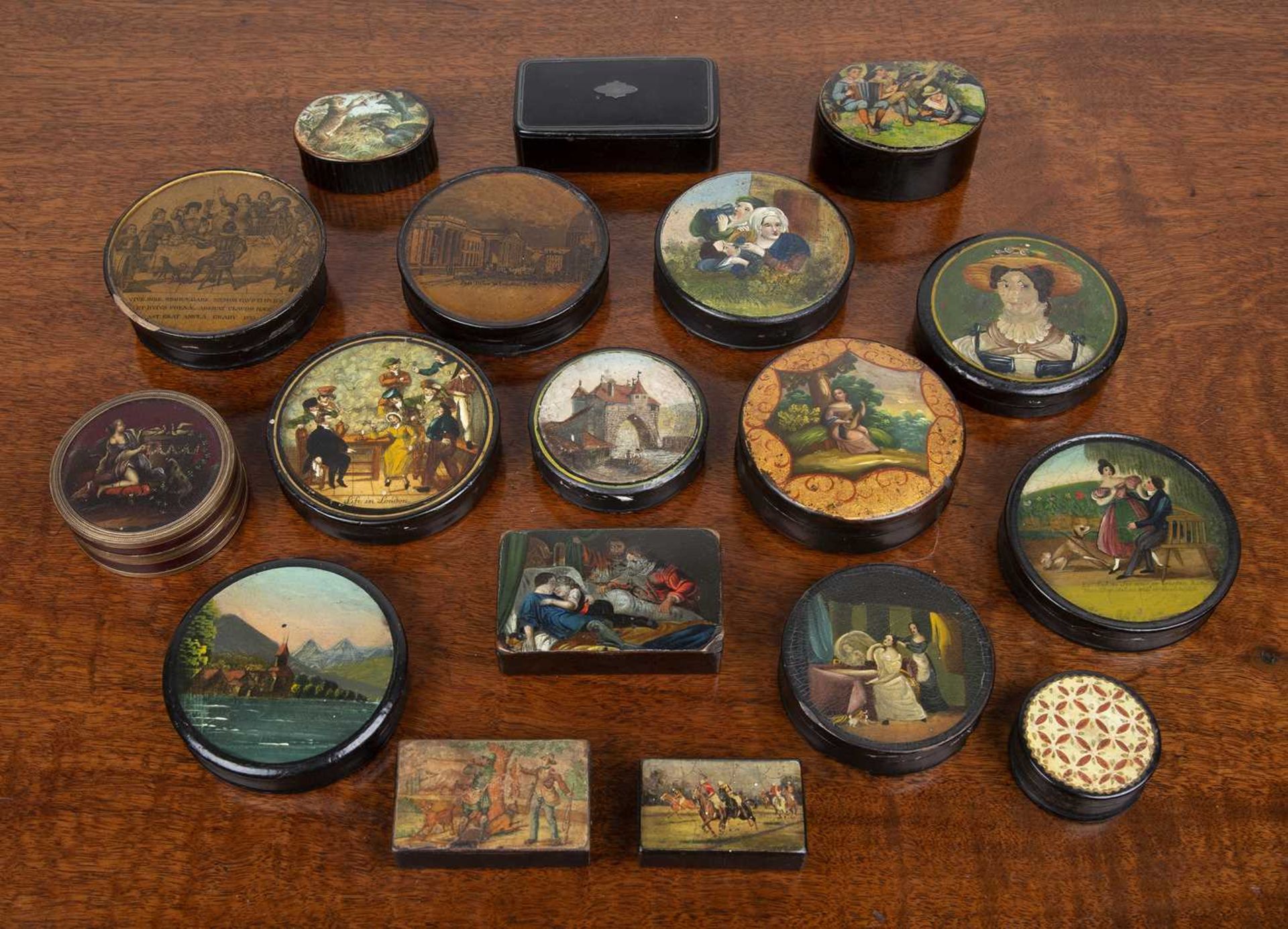 Collection of papier mache painted snuff boxes 19th Century and later, including some lacquered