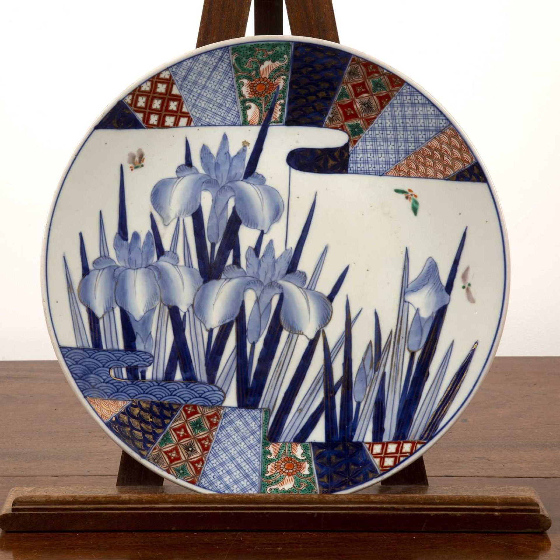 Imari charger Japanese, circa 1900, painted with central irises, within a brocaded border, 40cm