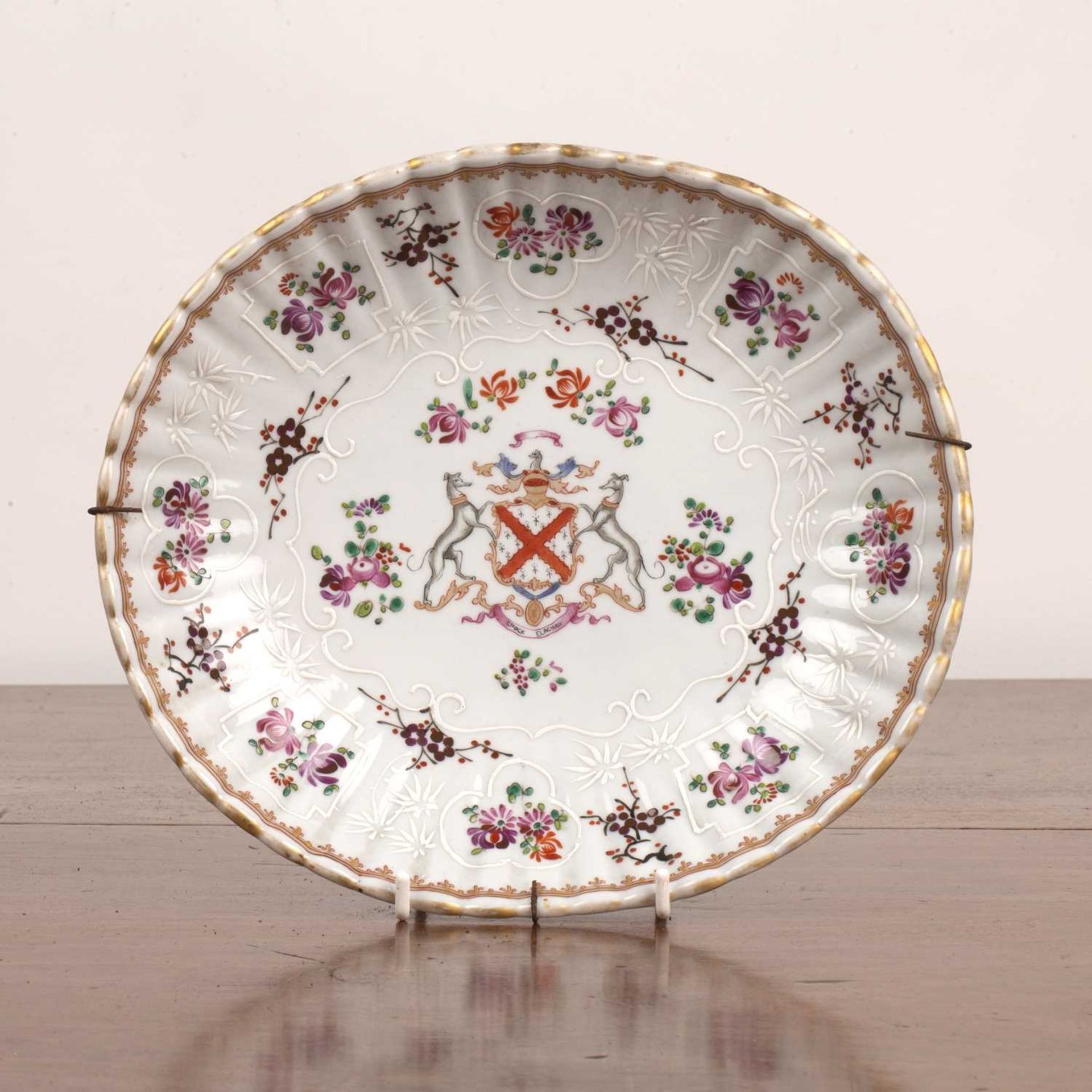 Samson porcelain Armorial plate painted in the famille rose palette with central coat of arms,