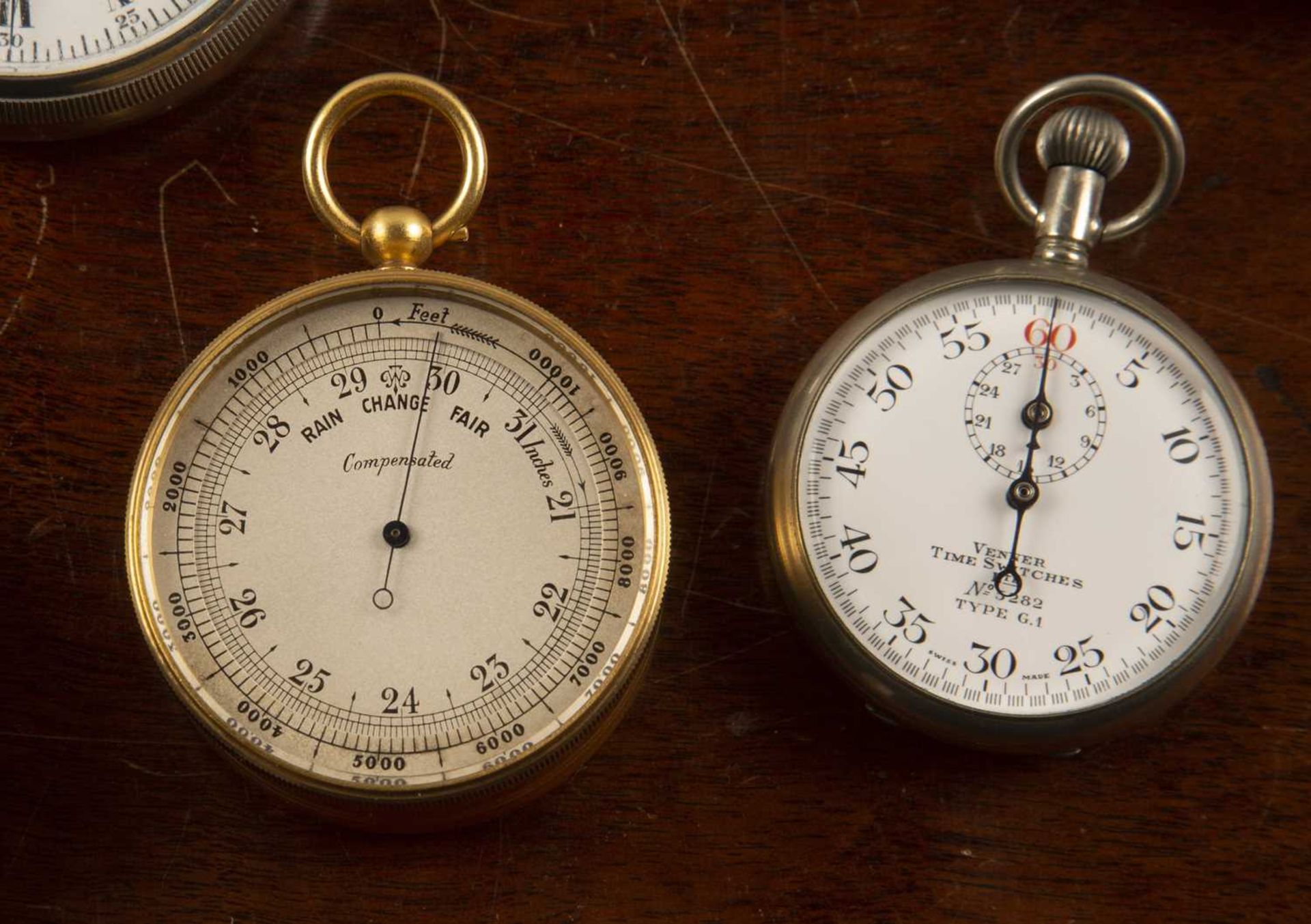 Leather-bound compensated pocket barometer unmarked, 5cm across, together with a cased stopwatch - Image 4 of 4