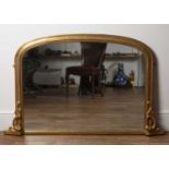 Giltwood overmantel mirror 19th Century, of fluted form with carved leaf mounts to the base, 81.