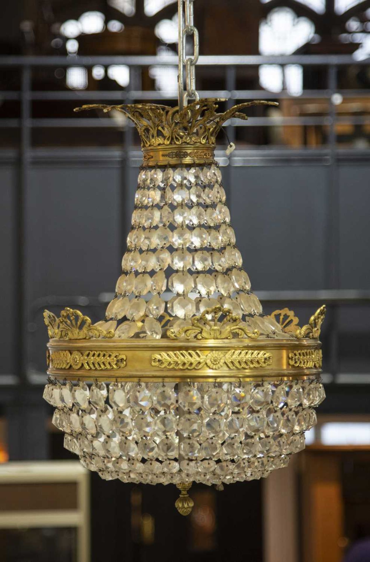 Glass and gilt metal classical-style chandelier of pear-shape proportion with classical leaf mounts, - Image 2 of 2