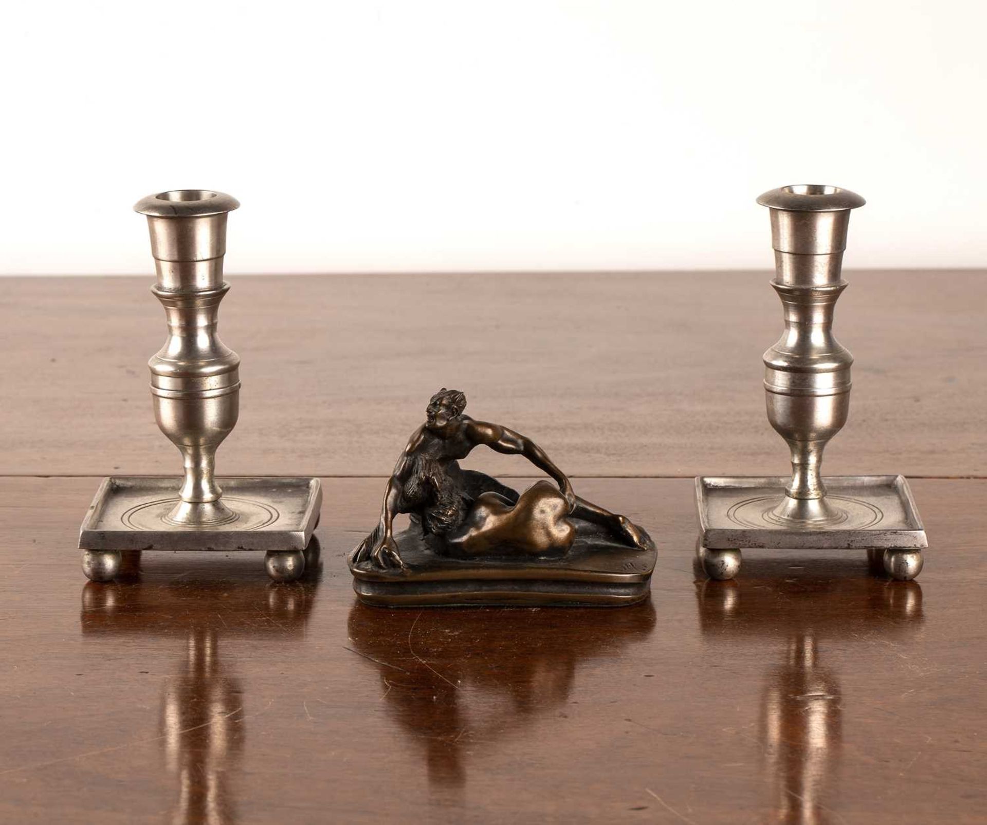 Pair of Paktong candle sticks 19th Century, on square bases, 14.5cm high, together with a bronzed