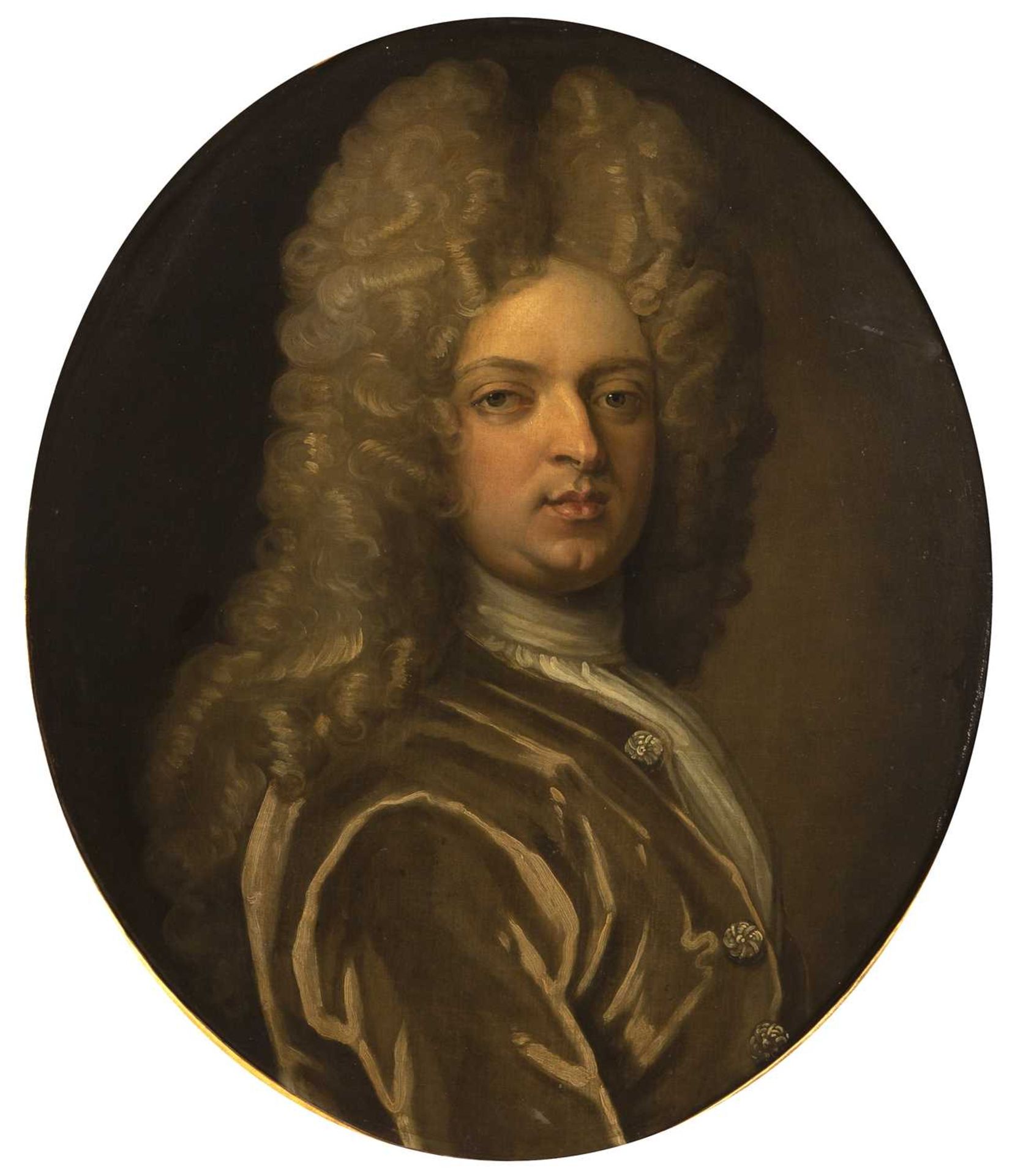 After Godfrey Kneller (1646-1723) Oval portrait of a nobleman wearing a green frockcoat, oil on