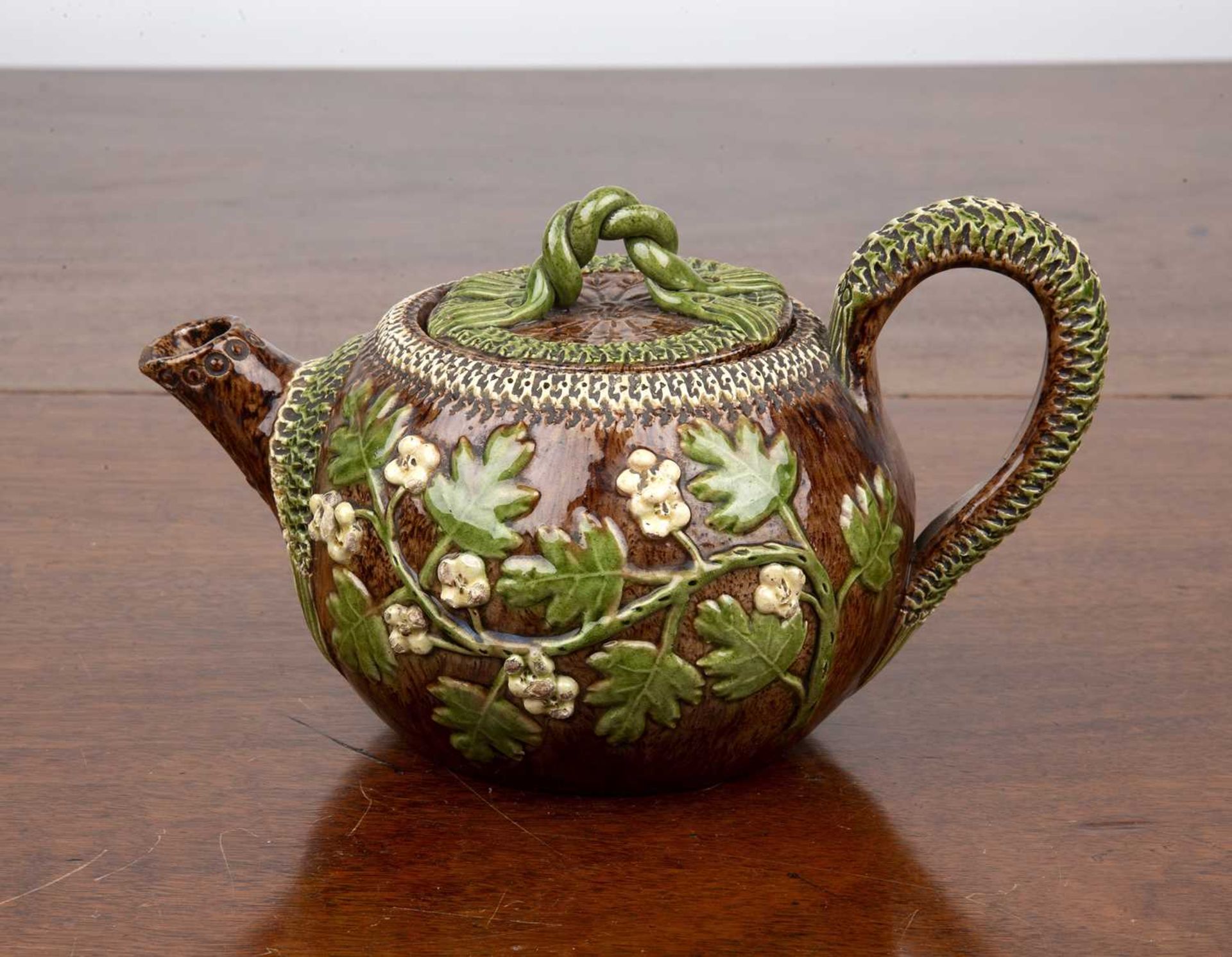 Rye pottery Bellevue hop ware teapot and cover 19th Century, decorated all over with a brown