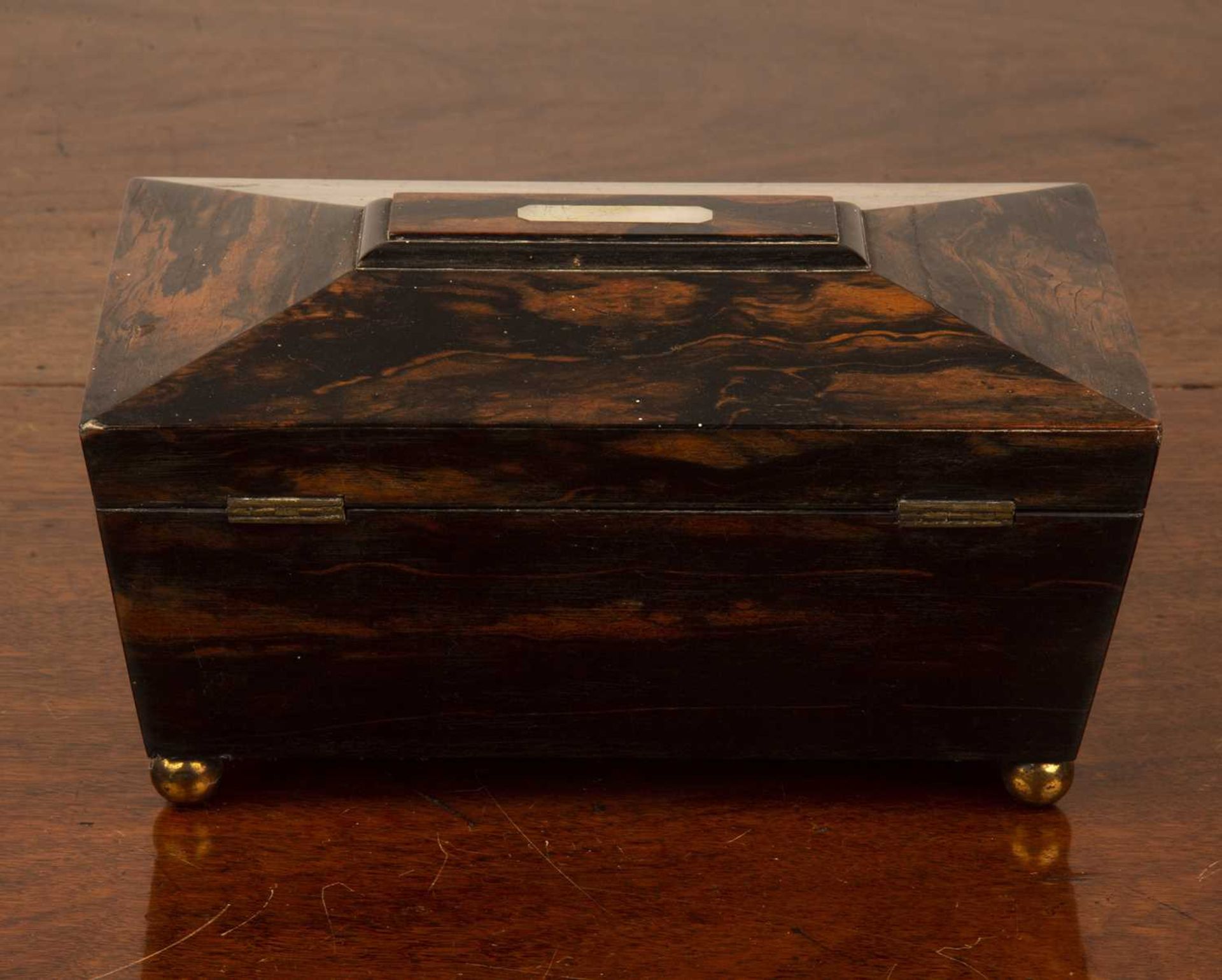 Coromandel sewing box 19th Century, of sarcophagus form with fitted interior on brass ball feet - Image 3 of 4