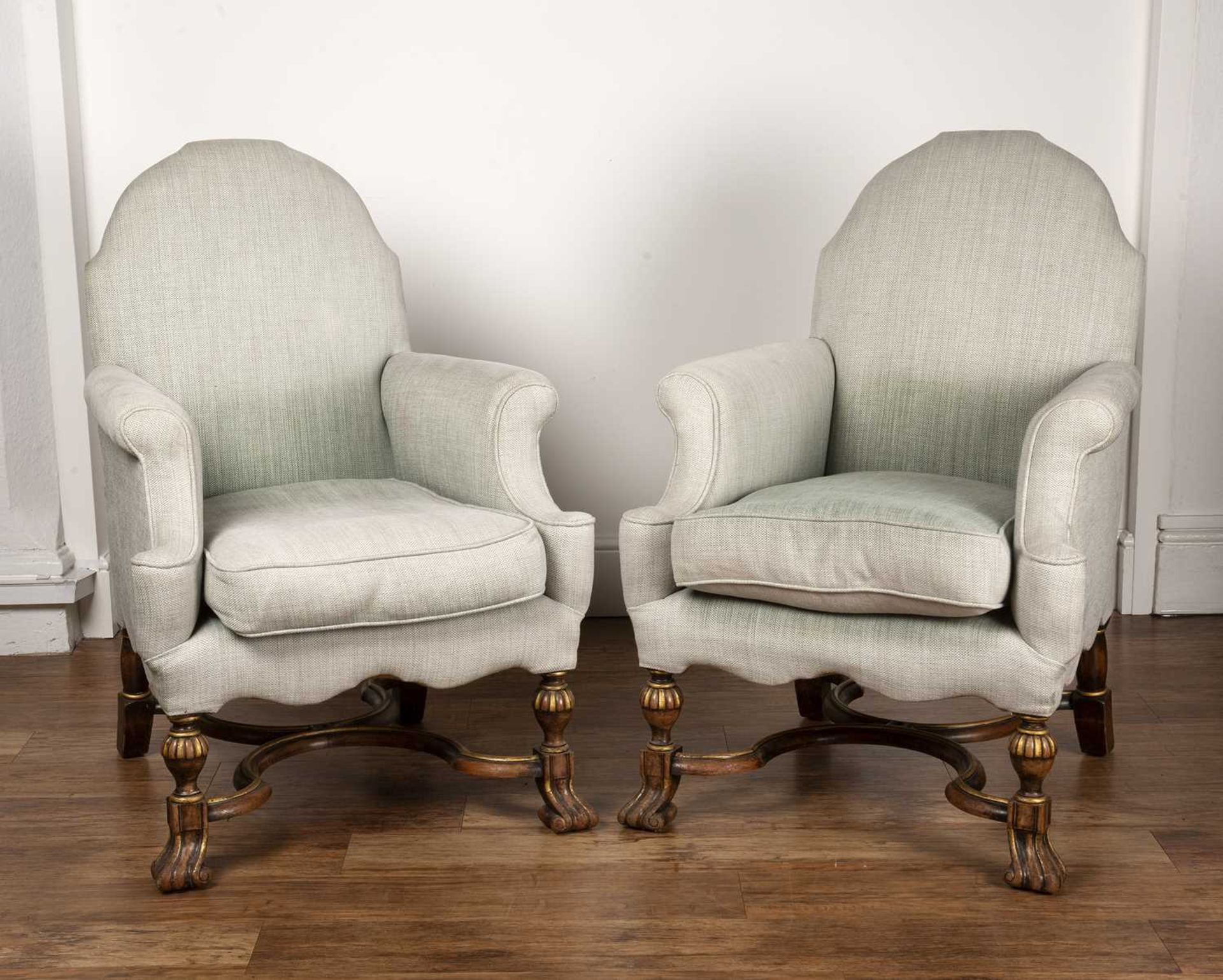 Pair of Howard and Sons chairs circa 1925, in the William and Mary style, with parcel gilt-shaped