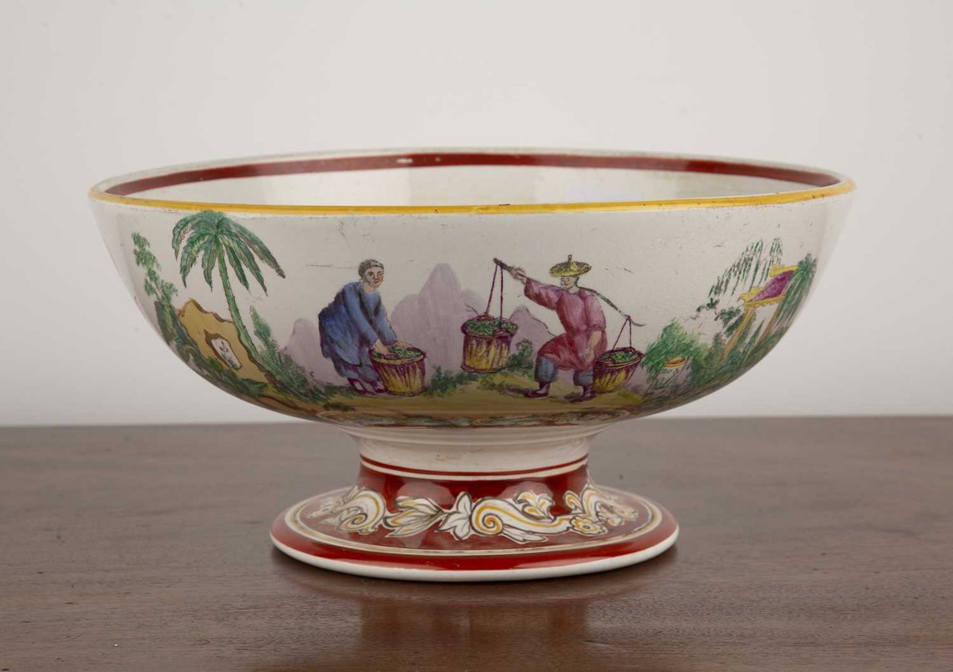 Large Staffordshire pottery pedestal bowl transfer printed and painted with a Chinese scene, 30cm