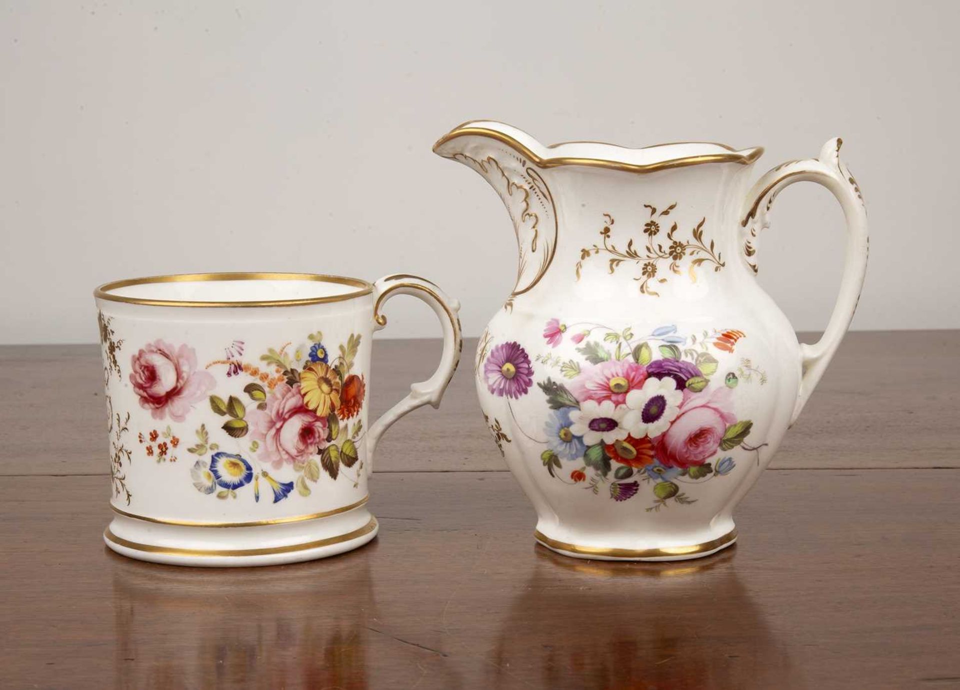 Coalport porcelain christening mug decorated with floral decoration, 9cm high, together with a