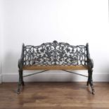 Cast iron garden bench 19th Century, in the Coalbrookdale 'rustic pattern', the back and side panels