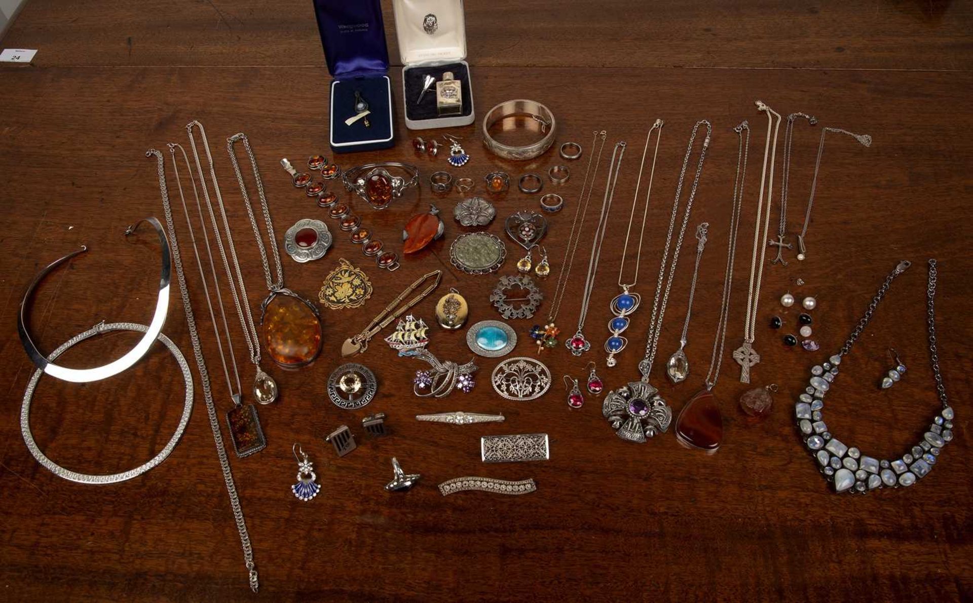 Collection of silver and white metal jewellery including a pair of silver squat candlesticks with