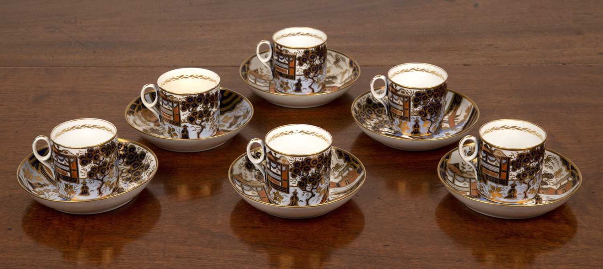 New Hall porcelain Early 19th Century, set of six coffee cans and saucers in the 1163 Imari