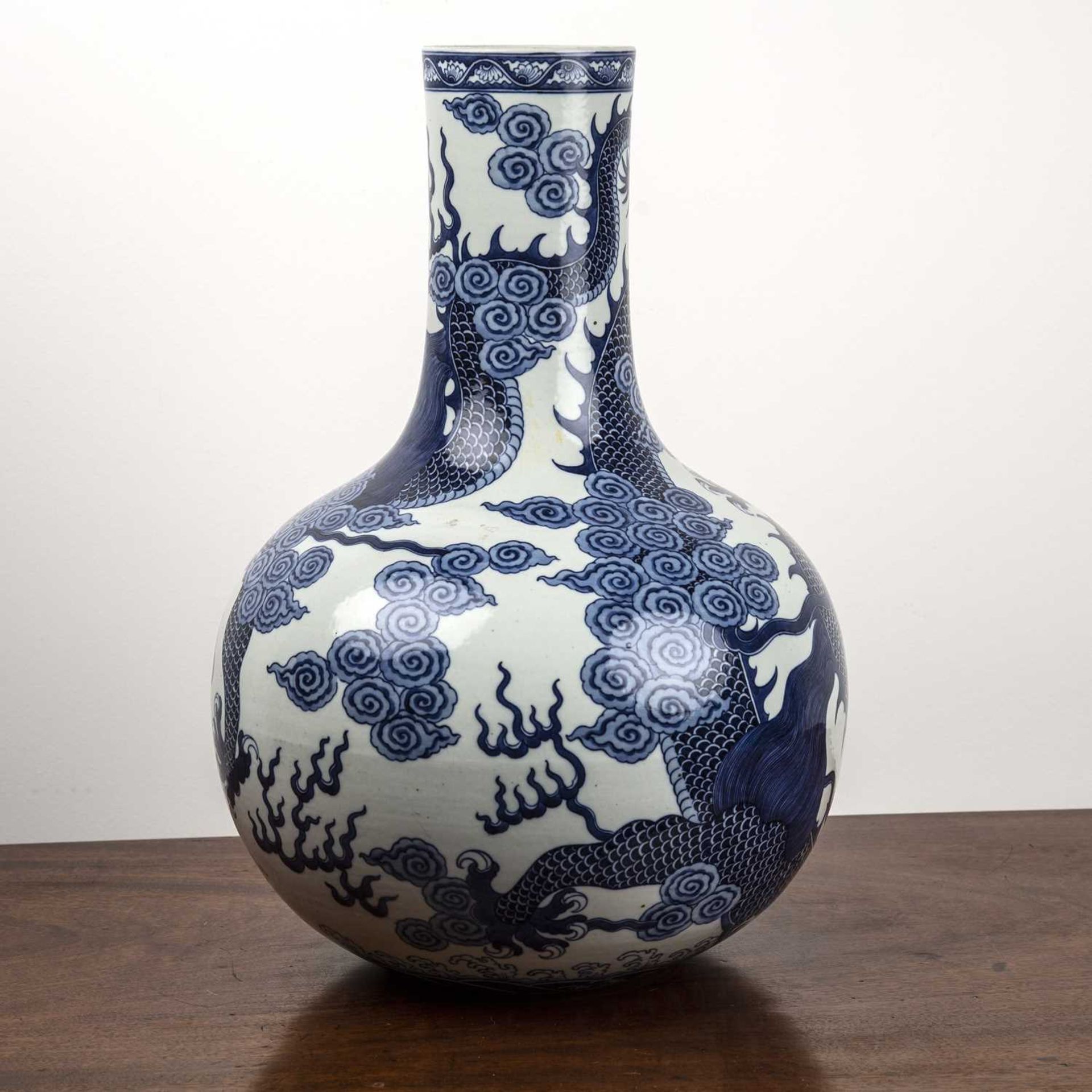Large blue and white bottle vase Chinese, decorated to the body with a dragon chasing a flaming - Image 2 of 3