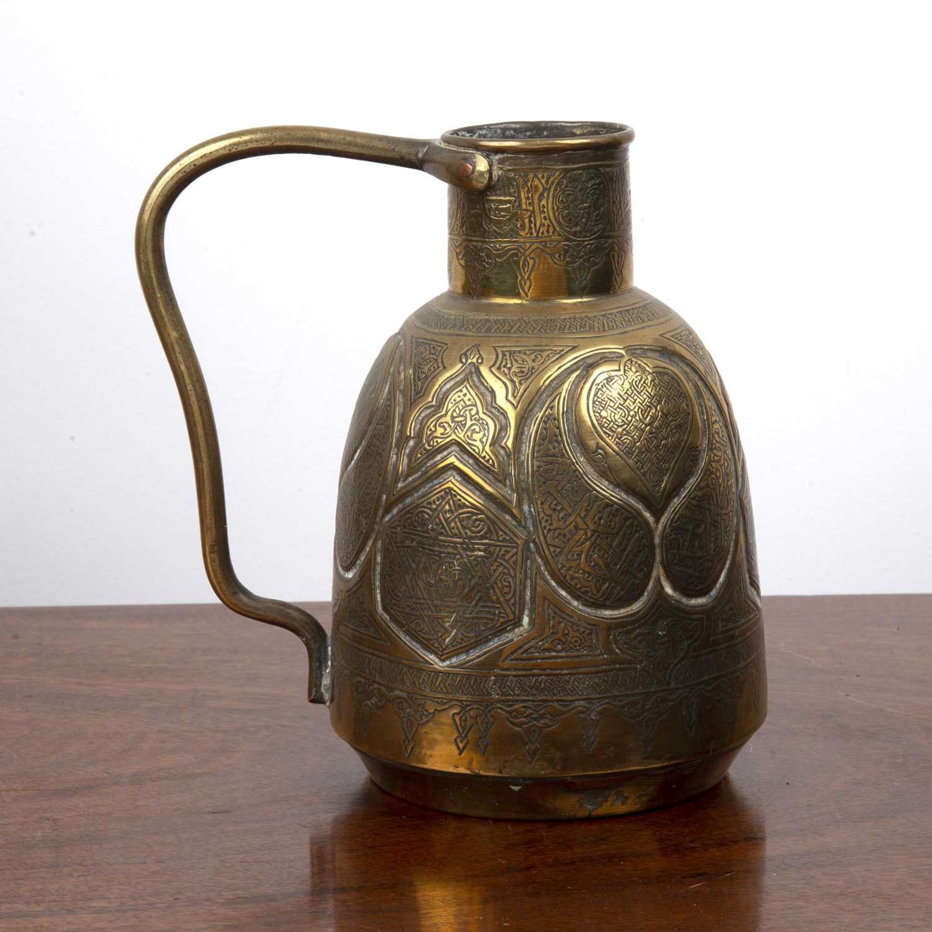 Qajar style jug Persian, with scrolling decoration, unmarked, 19cm high overall With overall wear, - Bild 2 aus 2