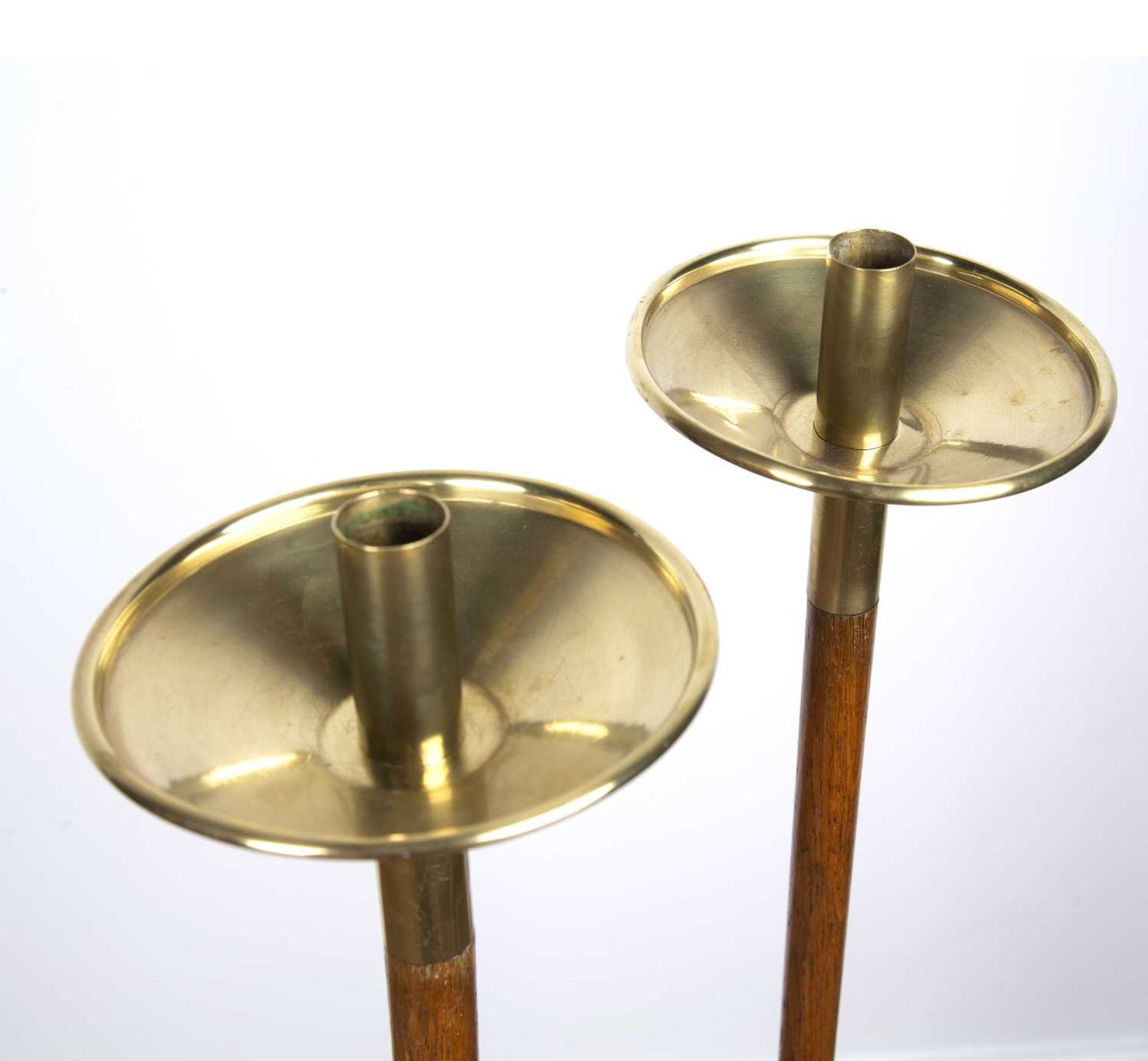 A pair of oak and brass tall floor standing candle stands in the Arts & Crafts style, 118cm high - Image 2 of 2