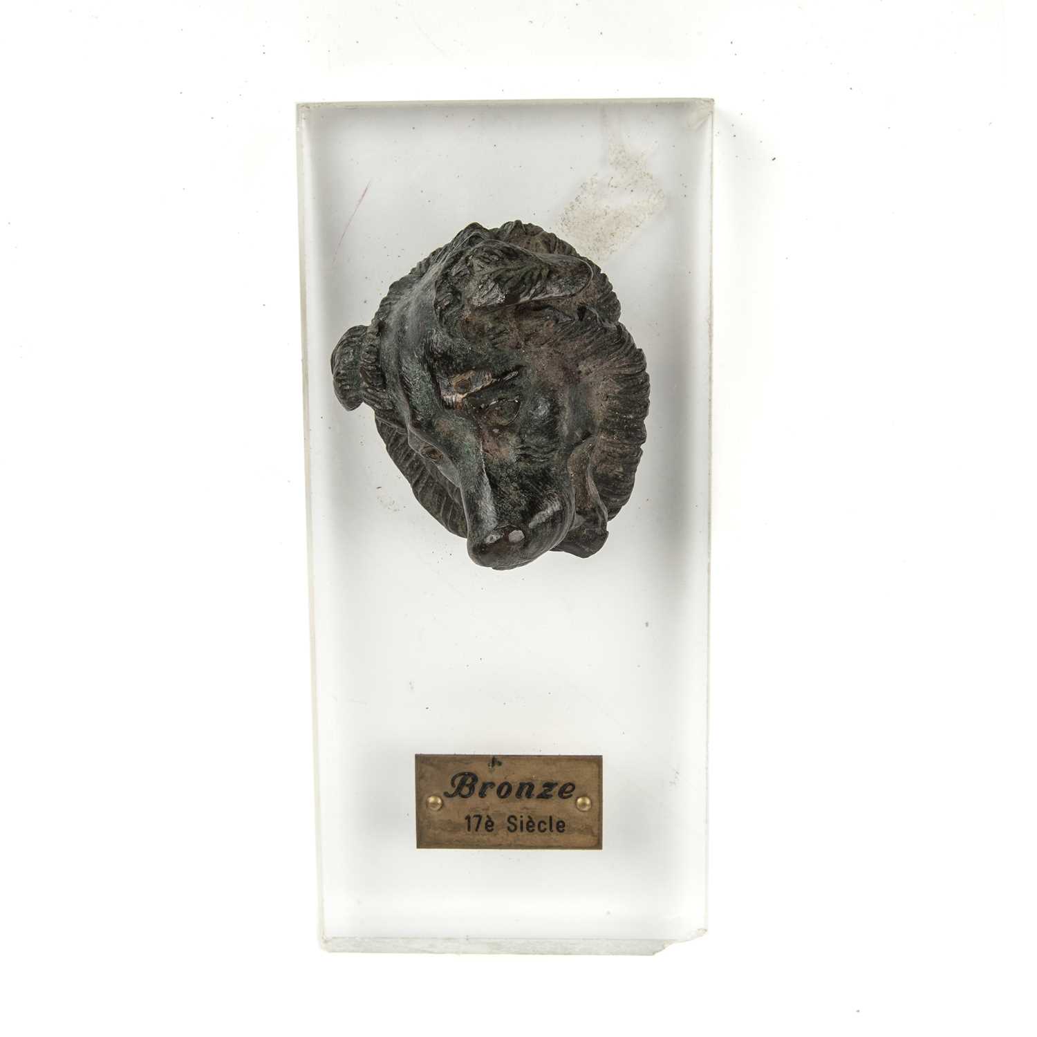 A 17th or 18th century bronze head of a dog, 6cm wide x 6cm deep x 7cm highSome small holes around