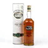 A 1 litre bottle of Bowmore 12 year old single malt whisky bottled in the late 1990's / early 2000'