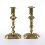 A pair of 18th century English brass candlesticks each 10cm wide x 18cm highAt present, there is