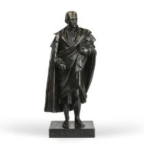 A 19th century bronze sculpture of Sir Walter Scott (1771-1832) on a slate plinth overall 16cm