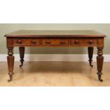 A William IV mahogany library table with a green leather inset top, six drawers with turned knob