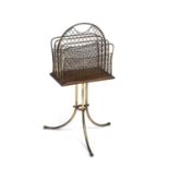 An Edwardian brass mesh four section rotating magazine rack overall 50cm wide x 85cm highSome