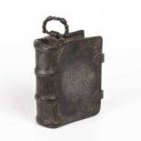 An antique German pewter flask in the form of a leather bound book, with a coat of arms to the front