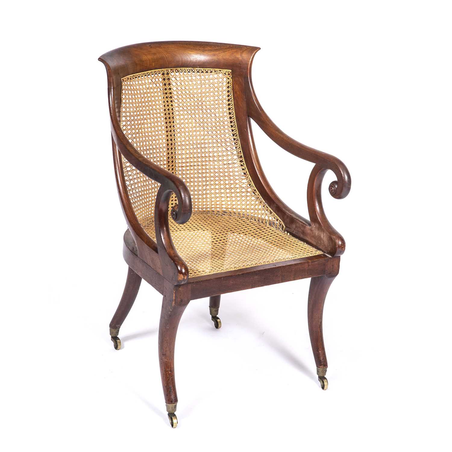 A Regency mahogany bergere library open armchair with a caned back and seat, scrolling arms, sabre - Bild 4 aus 11