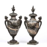 A pair of 18th century marble urns of baluster form with bronze mounts, 23cm wide x 45cm highOne