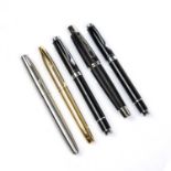 A Parker Frontier fountain pen, two Jaguar ball point pens, a Sheaffer gold plated fountain pen