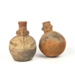 Two pre-Columbian pottery vessels, one with a round base, 14cm wide x 17cm high; and a further