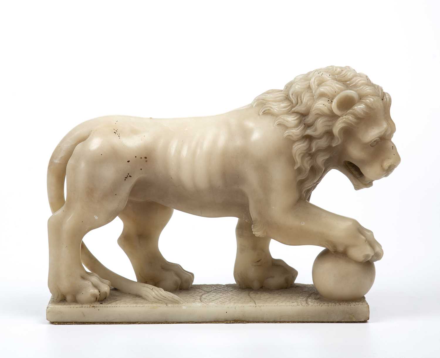 A late 18th/early 19th century carved alabaster lion 35cm wide x 25cm highSome hairline cracks to - Image 2 of 4