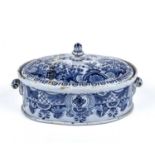 A mid 18th century blue and white Dutch Delft tureen and cover, 24cm wide x 13cm highRestored lid