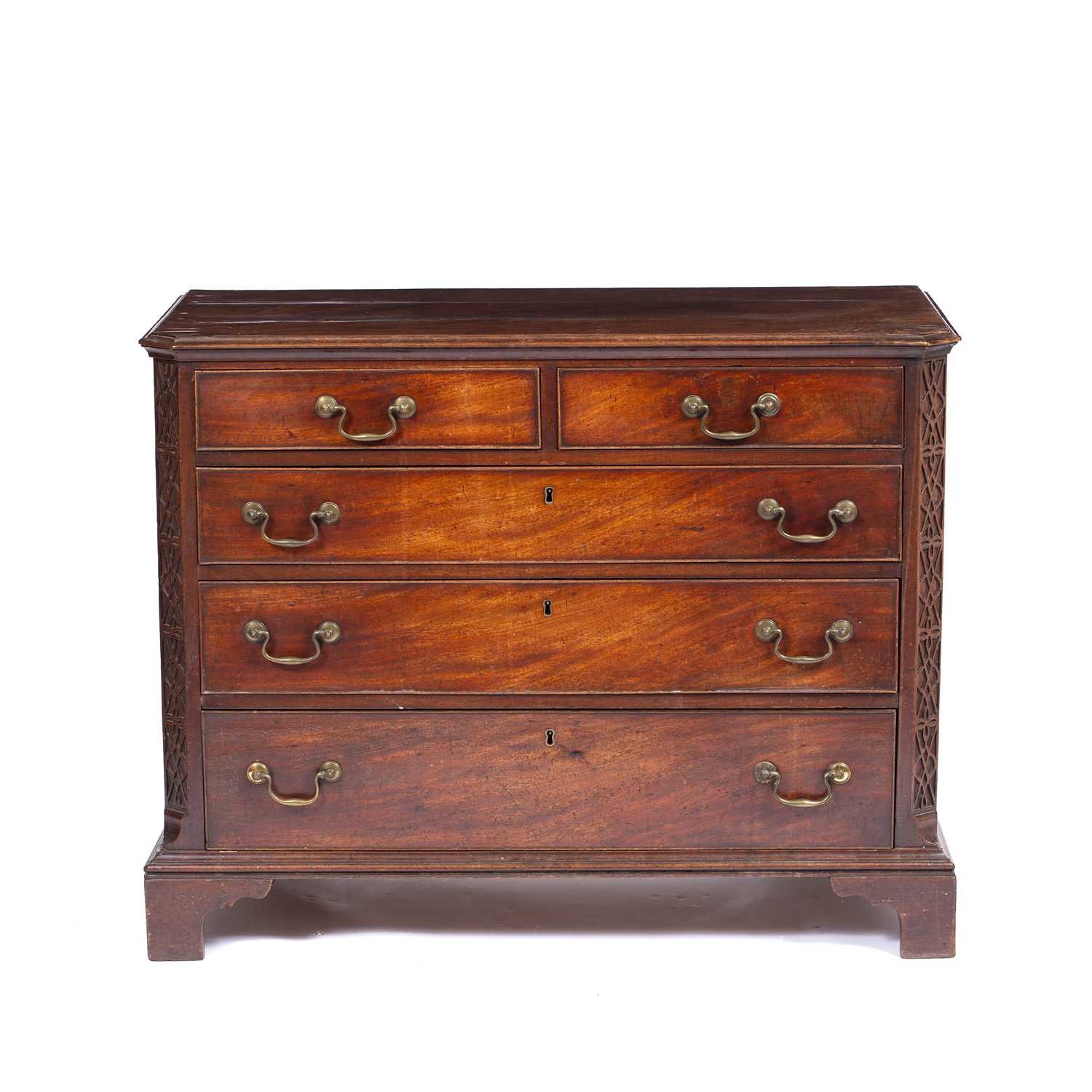A George III mahogany chest of two short and three long drawers with brass swan neck handles,