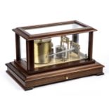 A Russell of Norwich barograph in a mahogany case, overall 40cm wide x 23.5cm deep x 23cm