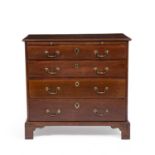 A George III mahogany chest of four graduated drawers with a brushing slide and swan neck handles,