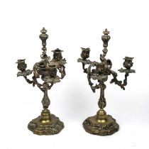 A pair of antique Rococco gilt metal three branch candelabra 15cm wide 41cm high