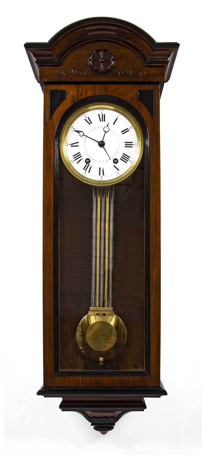 A late 19th century walnut and parcel ebonised regulator wall clock, the slightly convex white