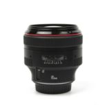 A Canon lens EF 85mm f/1.2 L 11 USM with ES-7911 hoodCondition good. No scratches. No box