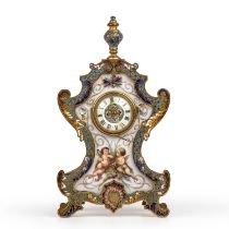 A late 19th century French gilt metal mantle clock with enamelled decoration and inset painted